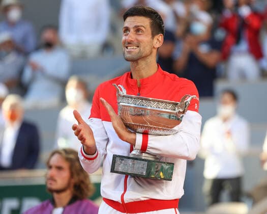 Winner Novak Djokovic sings the anthem and holds the trophy, trophy mens singles award ceremony, presentation Tennis French Open 2021 Grand Slam Roland Garros Paris France 13 June 2021 Copyright: xJuergenxHasenkopfx