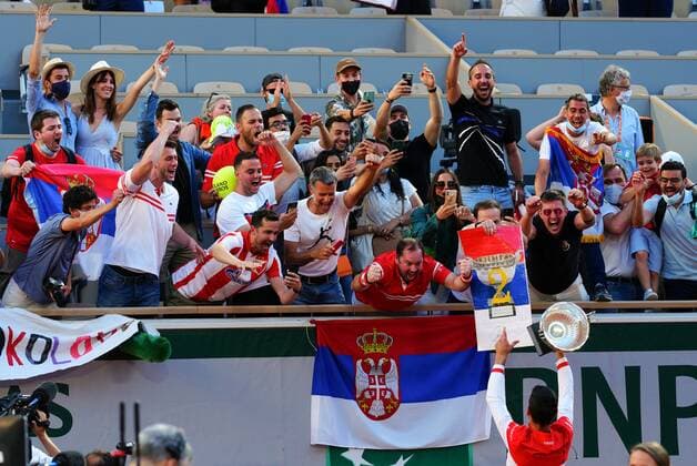 Mandatory Credit: Photo by Javier Garcia BPI Shutterstock (12058233ms) Novak Djokovic celebrates with Serbian fans after winning the Men s Singles final French Open Tennis, Day Fifteen, Roland Garros, Paris, France - 13 Jun 2021 French Open Tennis, Day Fifteen, Roland Garros, Paris, France - 13 Jun 2021  Copyright: xJavierxGarcia BPI Shutterstockx 12058233ms