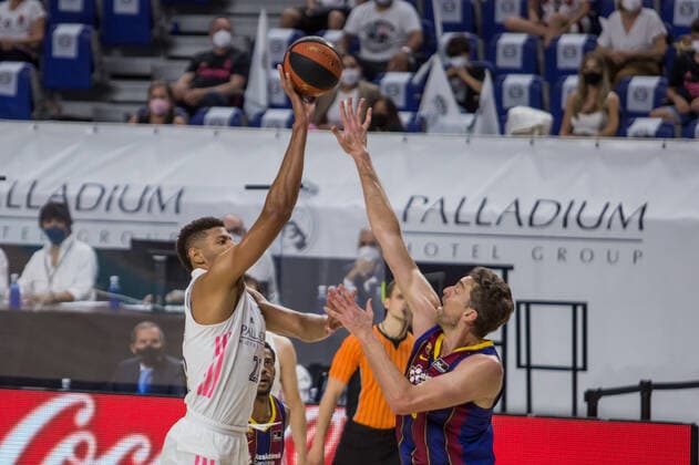 Spain: Real Madrid - FC Barcelona, Barca Edy Tavares (left) and Pau Gasol (right) during FC Barccelona victory over Real Madrid (75 - 89) in Liga Endesa finals series (game 1) celebrated in Madrid (Spain) at Wizink Center. June 13th 2021. Madrid Madrid Spain WiZink Center Copyright: JuanxCarlosxGarcíaxMate