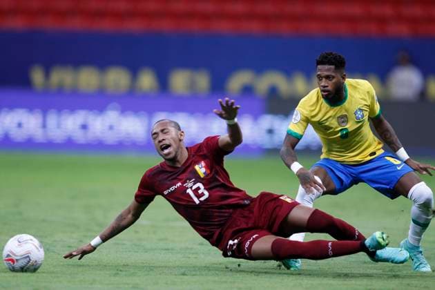 13th June 2021; Mane Garrincha Stadium, Brasilia, Distrito Federal, Brazil; Copa America, Brazil versus Venezuela; Fred of Brazil pulls down Jose Mart& xed;nez of Venezuela  ActionPlus12296090 AdalbertoxMarques