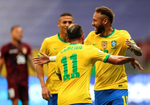 Brazil s Neymar Jr celebrates with his teammate Everton Ribeiro (L) after scoring against Venezuela, during the inaugural match of the Copa America at the Mane Garrincha Stadium in Brasilia, Brazil, 13 June 2021. Brazil - Venezuela !ACHTUNG: NUR REDAKTIONELLE NUTZUNG!  Copyright: xFernandoxBizerraxJrx AME5505 20210614-637592284961762400