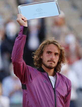 (210614) -- PARIS, June 14, 2021 -- Stefanos Tsitsipas of Greece reacts during the awarding ceremony after the Men s Singles finals match against Novak Djokovic of Serbia at the French Open tennis tournament at Roland Garros in Paris, France, June 13, 2021. ) (SP)FRANCE-PARIS-TENNIS-ROLAND GARROS-FRENCH OPEN-MEN S SINGLES-FINALS GaoxJing 