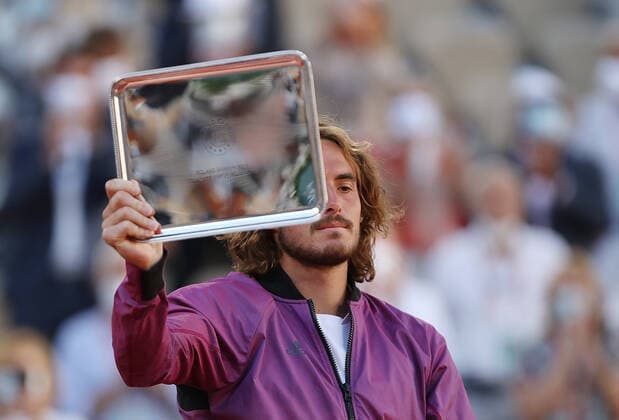 (210614) -- PARIS, June 14, 2021 -- Stefanos Tsitsipas of Greece reacts during the awarding ceremony after the Men s Singles finals match against Novak Djokovic of Serbia at the French Open tennis tournament at Roland Garros in Paris, France, June 13, 2021. ) (SP)FRANCE-PARIS-TENNIS-ROLAND GARROS-FRENCH OPEN-MEN S SINGLES-FINALS GaoxJing 