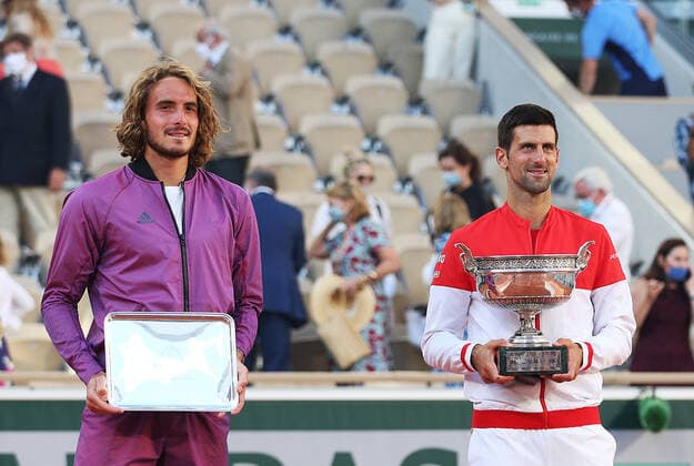 (210614) -- PARIS, June 14, 2021 -- Novak Djokovic (R) of Serbia and Stefanos Tsitsipas of Greece pose after their Men s Singles finals match at the French Open tennis tournament at Roland Garros in Paris, France, June 13, 2021. ) (SP)FRANCE-PARIS-TENNIS-ROLAND GARROS-FRENCH OPEN-MEN S SINGLES-FINALS GaoxJing 