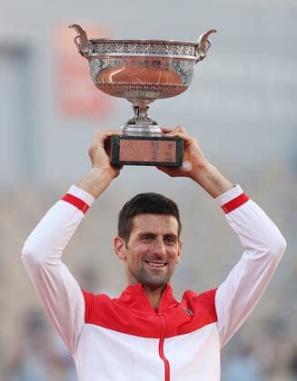 (210614) -- PARIS, June 14, 2021 -- Novak Djokovic of Serbia lifts the trophy after winning the Men s Singles finals match against Stefanos Tsitsipas of Greece at the French Open tennis tournament at Roland Garros in Paris, France, June 13, 2021. ) (SP)FRANCE-PARIS-TENNIS-ROLAND GARROS-FRENCH OPEN-MEN S SINGLES-FINALS GaoxJing 