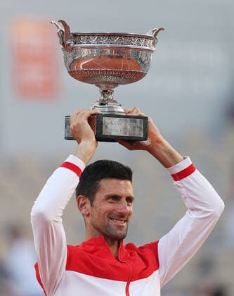 (210614) -- PARIS, June 14, 2021 -- Novak Djokovic of Serbia lifts the trophy after winning the Men s Singles finals match against Stefanos Tsitsipas of Greece at the French Open tennis tournament at Roland Garros in Paris, France, June 13, 2021. ) (SP)FRANCE-PARIS-TENNIS-ROLAND GARROS-FRENCH OPEN-MEN S SINGLES-FINALS GaoxJing 