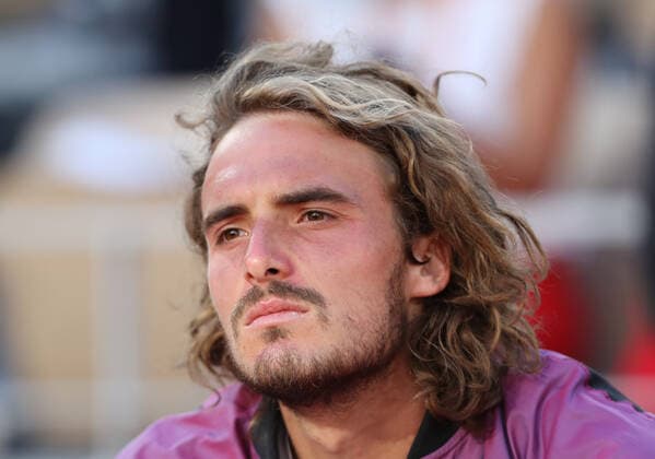 (210614) -- PARIS, June 14, 2021 -- Stefanos Tsitsipas of Greece reacts during the awarding ceremony after the Men s Singles finals match against Novak Djokovic of Serbia at the French Open tennis tournament at Roland Garros in Paris, France, June 13, 2021. ) (SP)FRANCE-PARIS-TENNIS-ROLAND GARROS-FRENCH OPEN-MEN S SINGLES-FINALS GaoxJing 