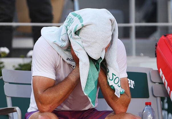 (210614) -- PARIS, June 14, 2021 -- Stefanos Tsitsipas of Greece reacts during the Men s Singles finals match against Novak Djokovic of Serbia at the French Open tennis tournament at Roland Garros in Paris, France, June 13, 2021. ) (SP)FRANCE-PARIS-TENNIS-ROLAND GARROS-FRENCH OPEN-MEN S SINGLES-FINALS GaoxJing 