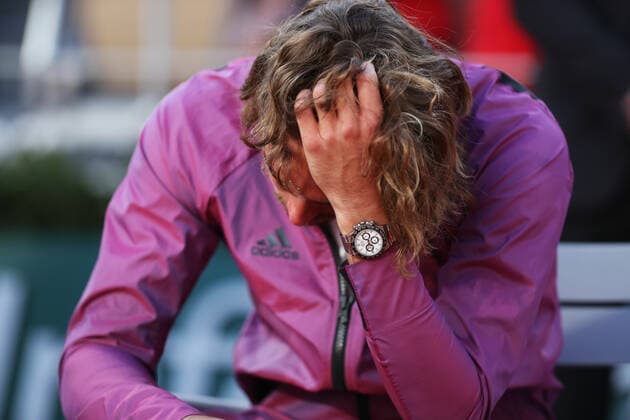 (210614) -- PARIS, June 14, 2021 -- Stefanos Tsitsipas of Greece reacts during the awarding ceremony after the Men s Singles finals match against Novak Djokovic of Serbia at the French Open tennis tournament at Roland Garros in Paris, France, June 13, 2021. ) (SP)FRANCE-PARIS-TENNIS-ROLAND GARROS-FRENCH OPEN-MEN S SINGLES-FINALS GaoxJing 