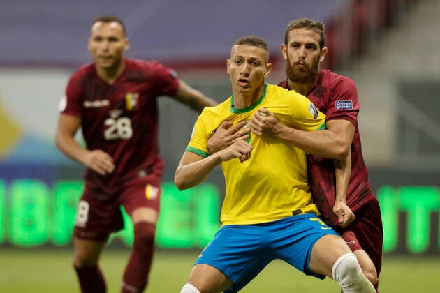 13th June 2021; Mane Garrincha Stadium, Brasilia, Distrito Federal, Brazil; Copa America, Brazil versus Venezuela; Richarlison of Brazil is grappled by Francisco La Mantia of Venezuela  ActionPlus12296176 LucasxFigueiredo