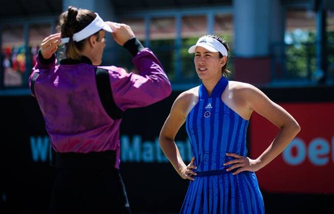 Mandatory Credit: Photo by Rob Prange Shutterstock (12072930dt) Andrea Petkovic of Germany & Garbine Muguruza of Spain playing doubles at the 2021 bett1open WTA, Tennis Damen 500 tennis tournament bett1open Tournament, Tennis, Berlin, Germany - 14 Jun 2021 bett1open Tournament, Tennis, Berlin, Germany - 14 Jun 2021  Copyright: xRobxPrange Shutterstockx 12072930dt