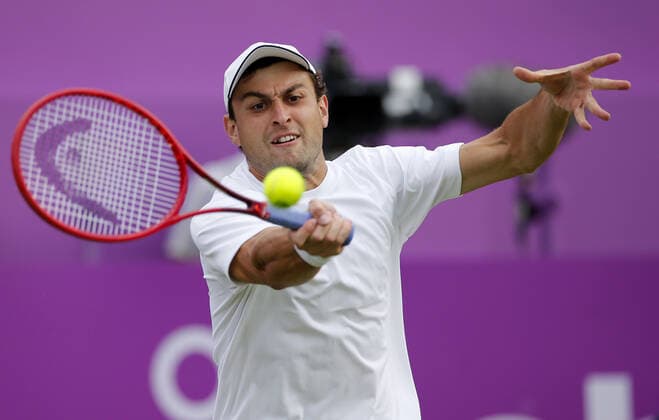 Mandatory Credit: Photo by Ella Ling BPI Shutterstock (12071591cp) Aslan Karatsev of Russia in action Cinch Championships, Day One, Tennis, Queens Club, London, UK - 14 June 2021 EDITORIAL USE ONLY No use with unauthorised audio, video, data, fixture lists, club league logos or live services. Online in-match use limited to 120 images, no video emulation. No use in betting, games or single club league player publications. Cinch Championships, Day One, Tennis, Queens Club, London, UK - 14 June 2021 EDITORIAL USE ONLY No use with unauthorised audio, video, data, fixture lists, club league logos or live services. Online in-match use limited to 120 images, no video emulation. No use in betting, games or single club league player publications. Copyright: xEllaxLing BPI Shutterstockx 12071591cp