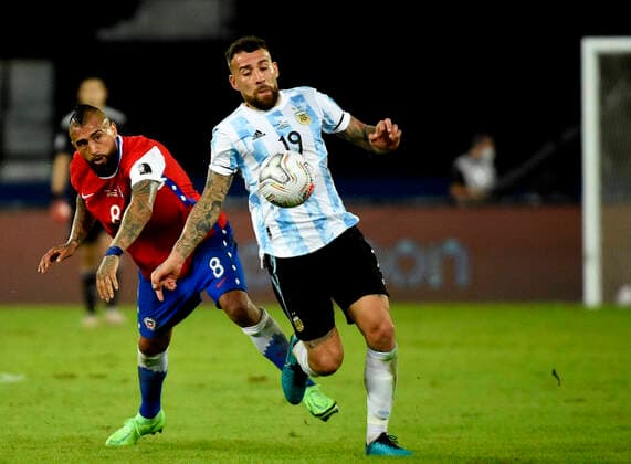 RIO DE JANEIRO, BRAZIL - JUNE 14: Nicolas Otamendi of Argentina competes for the ball with Arturo Vidal of Chile ,during the match between Argentina and Chile as part of Conmebol Copa America Brazil 2021 at Estadio Olimpico Nilton Santos on June 14, 2021 in Rio de Janeiro, Brazil. SPO, SOC, FOC, FOI, ICH 