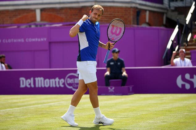 Mandatory Credit: Photo by Ella Ling BPI Shutterstock (12074706bt) Dan Evans of GBR celebrates Cinch Championships, Day Two, Tennis, Queens Club, London, UK - 15 June 2021 EDITORIAL USE ONLY No use with unauthorised audio, video, data, fixture lists, club league logos or live services. Online in-match use limited to 120 images, no video emulation. No use in betting, games or single club league player publications. Cinch Championships, Day Two, Tennis, Queens Club, London, UK - 15 June 2021 EDITORIAL USE ONLY No use with unauthorised audio, video, data, fixture lists, club league logos or live services. Online in-match use limited to 120 images, no video emulation. No use in betting, games or single club league player publications. Copyright: xEllaxLing BPI Shutterstockx 12074706bt