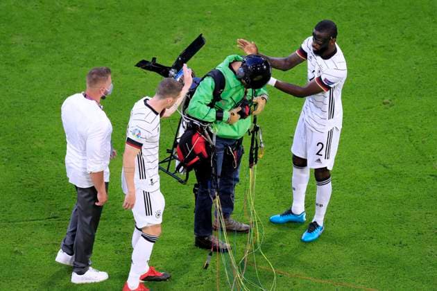 GREENPEAS activist landed in Allianz Arena with players RUEDIGER Antonio and GOSENS Robin before kick-off UEFA European Football Championship 2020 preliminary round match France Germany 1 0 on 15 June 2021 in Munich DFL REGULATES PROHIBIT ANY USE OF PHOTOGRAPHS as IMAGE SEQUENCES and or QUASI VIDEO
