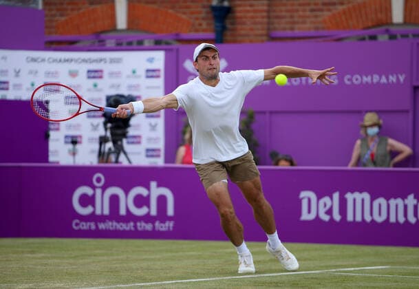 Mandatory Credit: Photo by Ella Ling BPI Shutterstock (12084430ag) Aslan Karatsev of Russia in action Cinch Championships, Day Three, Tennis, Queens Club, London, UK - 16 June 2021 EDITORIAL USE ONLY No use with unauthorised audio, video, data, fixture lists, club league logos or live services. Online in-match use limited to 120 images, no video emulation. No use in betting, games or single club league player publications. Cinch Championships, Day Three, Tennis, Queens Club, London, UK - 16 June 2021 EDITORIAL USE ONLY No use with unauthorised audio, video, data, fixture lists, club league logos or live services. Online in-match use limited to 120 images, no video emulation. No use in betting, games or single club league player publications. Copyright: xEllaxLing BPI Shutterstockx 12084430ag