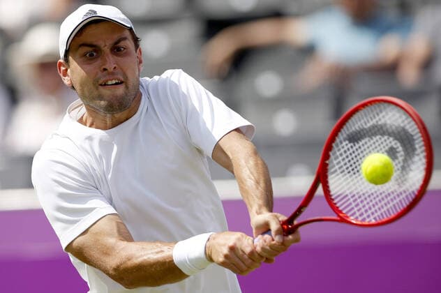 Mandatory Credit: Photo by Ella Ling BPI Shutterstock (12084430ae) Aslan Karatsev of Russia in action Cinch Championships, Day Three, Tennis, Queens Club, London, UK - 16 June 2021 EDITORIAL USE ONLY No use with unauthorised audio, video, data, fixture lists, club league logos or live services. Online in-match use limited to 120 images, no video emulation. No use in betting, games or single club league player publications. Cinch Championships, Day Three, Tennis, Queens Club, London, UK - 16 June 2021 EDITORIAL USE ONLY No use with unauthorised audio, video, data, fixture lists, club league logos or live services. Online in-match use limited to 120 images, no video emulation. No use in betting, games or single club league player publications. Copyright: xEllaxLing BPI Shutterstockx 12084430ae