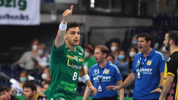Handball Bundesliga, Saison 2020 2021, 35 Spieltag, SC DHfK Leipzig vs HSC 2000 Coburg 16 06 2021 Lucas Krzikalla outside player DHfK Leipzig, back number 8 cheers after a goal during the Handball Bundesliga match DHfK Leipzig vs Coburg Leipzig Saxony Germany QUARTERBACK Immobilien Arena Am Sportforum 2