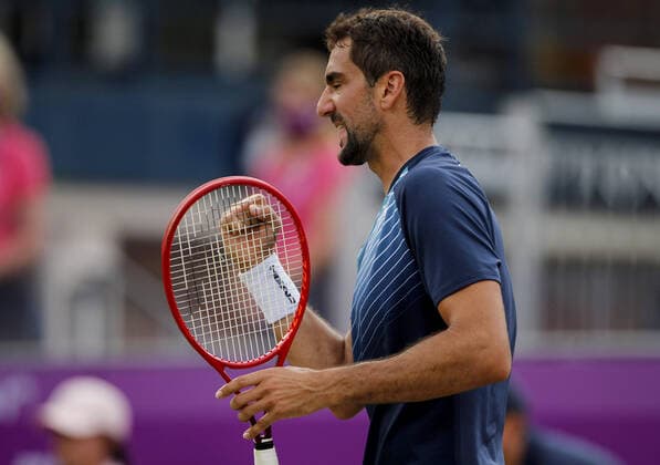 Mandatory Credit: Photo by Ella Ling BPI Shutterstock (12084430bx) Marin Cilic of Croatia celebrates Cinch Championships, Day Three, Tennis, Queens Club, London, UK - 16 June 2021 EDITORIAL USE ONLY No use with unauthorised audio, video, data, fixture lists, club league logos or live services. Online in-match use limited to 120 images, no video emulation. No use in betting, games or single club league player publications. Cinch Championships, Day Three, Tennis, Queens Club, London, UK - 16 June 2021 EDITORIAL USE ONLY No use with unauthorised audio, video, data, fixture lists, club league logos or live services. Online in-match use limited to 120 images, no video emulation. No use in betting, games or single club league player publications. Copyright: xEllaxLing BPI Shutterstockx 12084430bx