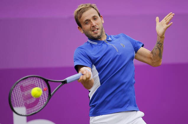 Mandatory Credit: Photo by Ella Ling BPI Shutterstock (12089309g) Daniel Evans of GBR in action Cinch Championships, Day Four, Tennis, Queens Club, London, UK - 17 June 2021 EDITORIAL USE ONLY No use with unauthorised audio, video, data, fixture lists, club league logos or live services. Online in-match use limited to 120 images, no video emulation. No use in betting, games or single club league player publications. Cinch Championships, Day Four, Tennis, Queens Club, London, UK - 17 June 2021 EDITORIAL USE ONLY No use with unauthorised audio, video, data, fixture lists, club league logos or live services. Online in-match use limited to 120 images, no video emulation. No use in betting, games or single club league player publications. Copyright: xEllaxLing BPI Shutterstockx 12089309g