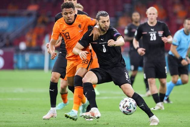 SOCCER - UEFA EURO, EM, Europameisterschaft,Fussball 2020, NED vs AUT AMSTERDAM,NETHERLANDS,17.JUN.21 - SOCCER - UEFA European Championship, EM, Europameisterschaft OEFB international match, Länderspiel, Nationalmannschaft Netherlands vs Austria. Image shows Donyell Malen (NED) and Aleksandar Dragovic (AUT).  GEPAxpictures xChristianxWalgram