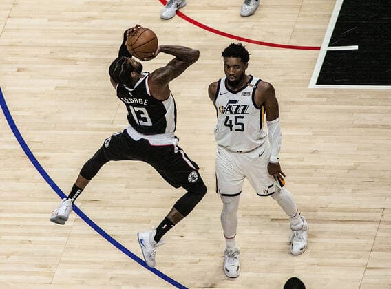 June 18, 2021, Los Angeles, California, USA: Paul George 13 of the Los Angeles Clippers takes a shot over Donovan Mitchell 45 of the Utah Jazz during Round 2, Game 6 of the 2021 NBA, Basketball Herren, USA Playoffs on Friday June 18, 2021, at the Staples Center in Los Angeles, California. PI Los Angeles USA - ZUMAp124 20210618_zaa_p124_009 Copyright: xPHILLIPxKIMx