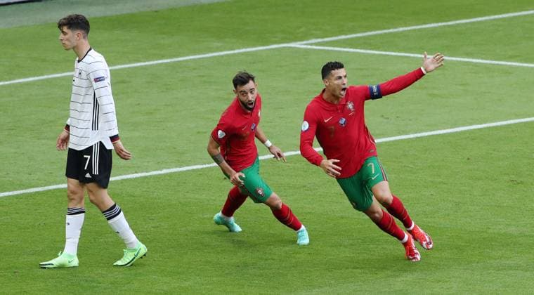 Cristiano Ronaldo 1 0, Bruno Borges Fernandes jubilant joy emotion jubilation after 1 0 Sport Football Euro 2020 European Championship EM National Team DFB Men Season 2020 2021 19 06 2021 Portugal POR vs Germany GER DFL regulations prohibit any use of photographs as image sequences and or quasi video