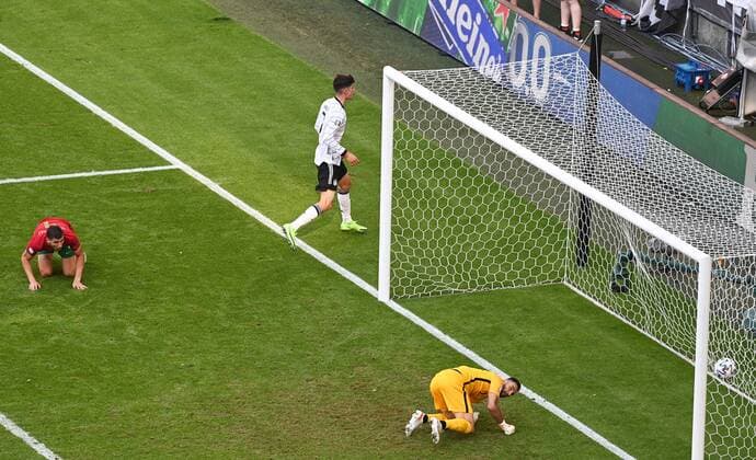 Football, Men, 2020 21 season, Euro 2020, Group F 2 matchday in Munich, Portugal Germany, own goal by Ruben Dias Portugal to make it 1 1 against goalkeeper Rui Patricio Portugal , above Kai Havertz Germany , 19 06 2021, Copyright: xMatthiasxKochx