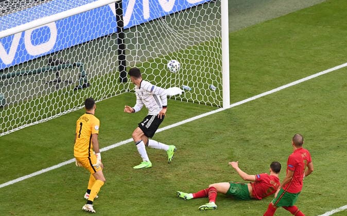 Football, Men, 2020 21 season, Euro 2020, Group F 2 matchday in Munich, Portugal Germany, Kai Havertz Germany scores the goal to make it 1 3 against goalkeeper Rui Patricio Portugal , Ruben Dias Portugal and Pepe Portugal , 19 06 2021, Copyright: xMatthiasxKochx