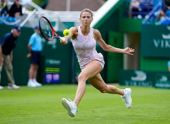 Mandatory Credit: Photo by Dave Shopland BPI Shutterstock (12115545a) Camila Giorgi from Italy action during her final qualifying round win Viking International Championships, Day Two, Tennis, Eastbourne, East Sussex, UK - 20 June 2021 EDITORIAL USE ONLY No use with unauthorised audio, video, data, fixture lists, club league logos or live services. Online in-match use limited to 120 images, no video emulation. No use in betting, games or single club league player publications. Viking International Championships, Day Two, Tennis, Eastbourne, East Sussex, UK - 20 June 2021 EDITORIAL USE ONLY No use with unauthorised audio, video, data, fixture lists, club league logos or live services. Online in-match use limited to 120 images, no video emulation. No use in betting, games or single club league player publications. Copyright: xDavexShopland BPI Shutterstockx 12115545a
