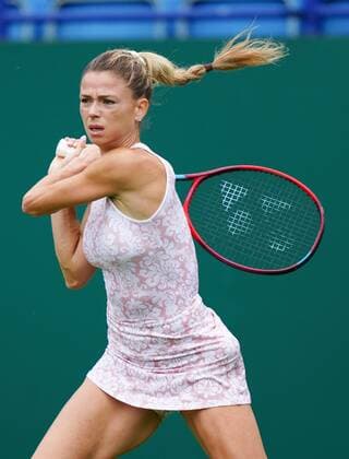Mandatory Credit: Photo by Dave Shopland BPI Shutterstock (12115545s) Camila Giorgi from Italy action during her final qualifying round win Viking International Championships, Day Two, Tennis, Eastbourne, East Sussex, UK - 20 June 2021 EDITORIAL USE ONLY No use with unauthorised audio, video, data, fixture lists, club league logos or live services. Online in-match use limited to 120 images, no video emulation. No use in betting, games or single club league player publications. Viking International Championships, Day Two, Tennis, Eastbourne, East Sussex, UK - 20 June 2021 EDITORIAL USE ONLY No use with unauthorised audio, video, data, fixture lists, club league logos or live services. Online in-match use limited to 120 images, no video emulation. No use in betting, games or single club league player publications. Copyright: xDavexShopland BPI Shutterstockx 12115545s
