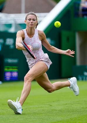 Mandatory Credit: Photo by Dave Shopland BPI Shutterstock (12115545ae) Italy s Camila Giorgi in action Viking International Championships, Day Two, Tennis, Eastbourne, East Sussex, UK - 20 June 2021 EDITORIAL USE ONLY No use with unauthorised audio, video, data, fixture lists, club league logos or live services. Online in-match use limited to 120 images, no video emulation. No use in betting, games or single club league player publications. Viking International Championships, Day Two, Tennis, Eastbourne, East Sussex, UK - 20 June 2021 EDITORIAL USE ONLY No use with unauthorised audio, video, data, fixture lists, club league logos or live services. Online in-match use limited to 120 images, no video emulation. No use in betting, games or single club league player publications. Copyright: xDavexShopland BPI Shutterstockx 12115545ae