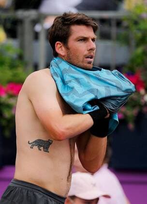 Mandatory Credit: Photo by Ella Ling BPI Shutterstock (12115524g) Cameron Norrie of Great Britain changes shirts showing a leopard tattoo Cinch Championships, Day Seven, Tennis, Queens Club, London, UK - 20 June 2021 EDITORIAL USE ONLY No use with unauthorised audio, video, data, fixture lists, club league logos or live services. Online in-match use limited to 120 images, no video emulation. No use in betting, games or single club league player publications. Cinch Championships, Day Seven, Tennis, Queens Club, London, UK - 20 June 2021 EDITORIAL USE ONLY No use with unauthorised audio, video, data, fixture lists, club league logos or live services. Online in-match use limited to 120 images, no video emulation. No use in betting, games or single club league player publications. Copyright: xEllaxLing BPI Shutterstockx 12115524g
