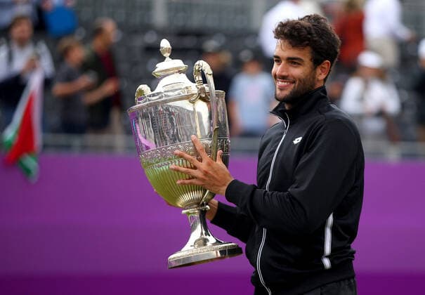 Mandatory Credit: Photo by Ella Ling BPI Shutterstock (12115524x) Matteo Berrettini of Italy celebrates with the trophy Cinch Championships, Day Seven, Tennis, Queens Club, London, UK - 20 June 2021 EDITORIAL USE ONLY No use with unauthorised audio, video, data, fixture lists, club league logos or live services. Online in-match use limited to 120 images, no video emulation. No use in betting, games or single club league player publications. Cinch Championships, Day Seven, Tennis, Queens Club, London, UK - 20 June 2021 EDITORIAL USE ONLY No use with unauthorised audio, video, data, fixture lists, club league logos or live services. Online in-match use limited to 120 images, no video emulation. No use in betting, games or single club league player publications. Copyright: xEllaxLing BPI Shutterstockx 12115524x