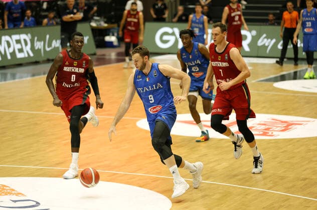 Photo Nicolo Melli Italy is fast as Voigtmann and left Isaac Bonga Basketball Supercup Sun 20 06 2021 4 Nations Cup in Hamburg Germany Italy