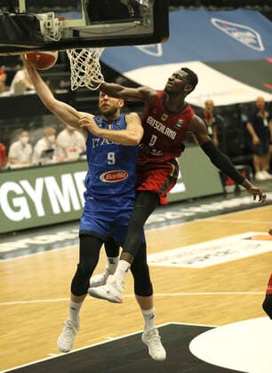 Photo Nicolo Melli Italy is fast as Voigtmann and left Isaac Bonga Basketball Supercup Sun 20 06 2021 4 Nations Cup in Hamburg Germany Italy