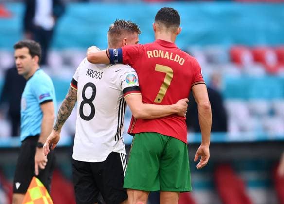 FOOTBALL Euro 2021 GROUP C match 24 in Munich Portugal Germany 19 06 2021 Cristiano Ronaldo right, Portugal hugs Toni Kroos left, Germany after the match