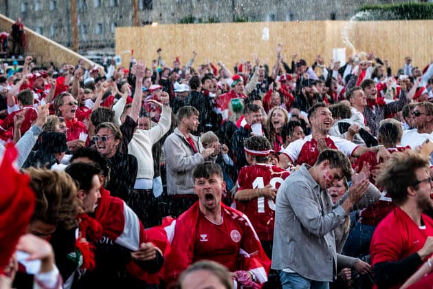 Fans follow Denmarks match against Russia, shown on big screen at Ofelia Beach in Copenhagen, Monday 21 June 2021, Copenhagen Denmark  Copyright: RitzauxScanpix IdaxMariexOdgaardx cop103 spdk20210622-014426-L