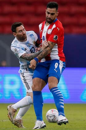 (210622) -- BRASILIA, June 22, 2021 -- Lionel Messi (L) of Argentina vies with Gabriel Avalos of Paraguay during the 2021 Copa America group A football match between Argentina and Paraguay in Brasilia, Brazil, on June 21, 2021. ) (SP)BRAZIL-BRASILIA-COPA AMERICA-ARGENTINA VS PARAGUAY LucioxTavora 