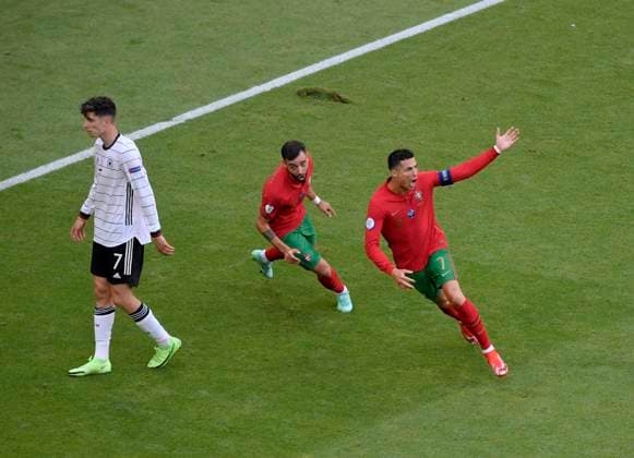 19 06 2021, football, European Championship 2020, group match group F, Portugal Germany, in the football arena Munich r Christiano Ronaldo Portugal goal celebration, l Kai Havertz Germany sad