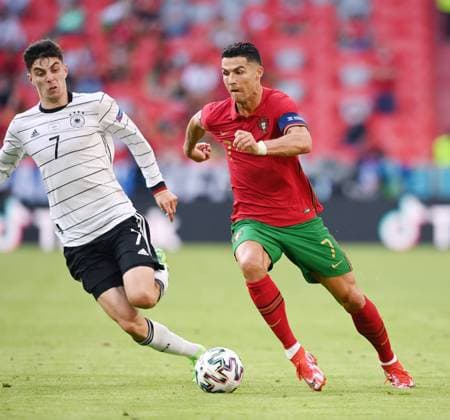 FOOTBALL Euro 2021 GROUP C Match 24 in Munich Portugal Germany 19 06 2021 Cristiano Ronaldo right, Portugal on the ball against Kai Havertz left, Germany