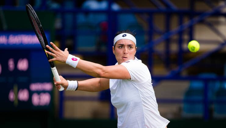 June 23, 2021, EASTBOURNE, GREAT BRITAIN: Ons Jabeur of Tunisia in action during the second round at the 2021 Viking International WTA, Tennis Damen 500 tennis tournament against Jelena Ostapenko of Latvia EASTBOURNE GREAT BRITAIN - ZUMAa181 20210623_zaa_a181_012 Copyright: xRobxPrangex