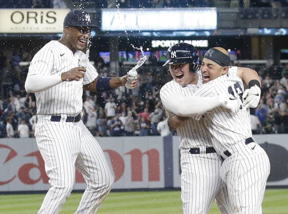 Sport Bilder des Tages New York Yankees Luke Voit celebrates with Rougned Odor and Miguel Aguilar after hitting a walk off RBI single in the 9th inning against the Kansas City Royals at Yankee Stadium on Wednesday, June 23, 2021 in New York City. The Yankees defeated the Royals 6-5.  NYP20210623122 JOHNxANGELILLO