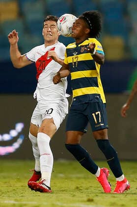 (210624) -- GOIANIA, June 24, 2021 -- Ecuador s Angelo Preciado (R) vies with Peru s Santiago Ormeno during the 2021 Copa America group B football match between Ecuador and Peru in Goiania, Brazil, on June 23, 2021. ) (SP)BRAZIL-GOIANIA-COPA AMERICA-ECUADOR VS PERU LUCIOxTAVORA 