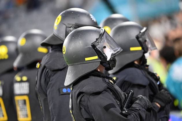 Police, police officers, support squad, USK in front of the Hungarian fan block Group phase, preliminary round Group F, match M36, Germany GER Hungary HUN 2 2, on 23 06 2021 in Munich Germany, Football Arena Alliianz Arena Football EM 2020 from 11 06 2021 11 07 2021