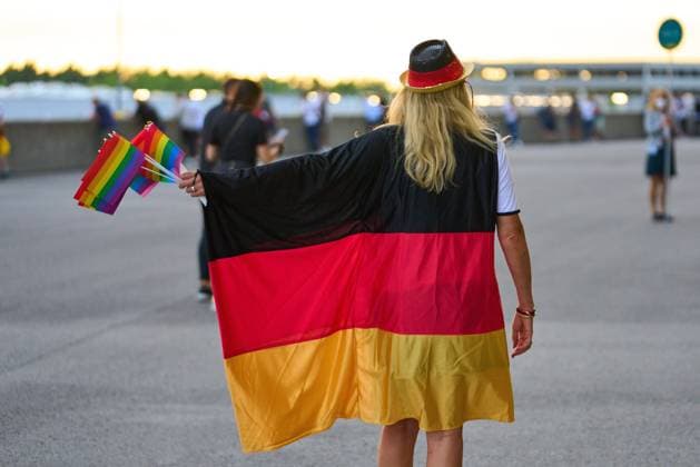 Female fan with german national flag in the Group F match GERMANY - HUNGARY 2-2 at the football UEFA European Championships 2020 in Season 2020 2021 on June 23, 2021 in Munich, Germany.