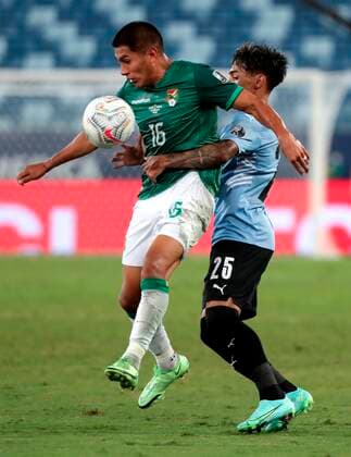 Uruguay s Facundo Torres in action against Bolivia s Erwin Saavedra, during a match for Group A of the Copa America at the Arena Pantanal stadium in Cuiaba, Brazil, 24 June 2021. Bolivia - Uruguay !ACHTUNG: NUR REDAKTIONELLE NUTZUNG!  Copyright: xRaulxMartinezx AME8308 20210624-4271f2e816c6329bcaeae5db63342e2bf0f55411