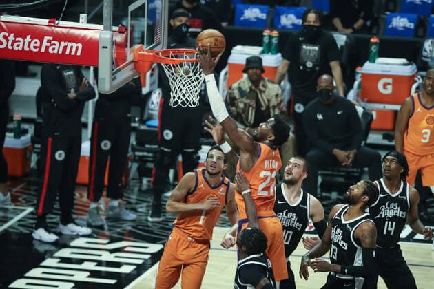 LOS ANGELES, CA - JUNE 24: Phoenix Suns center Deandre Ayton (22) lays the ball up during the Phoenix Suns game versus the Los Angeles Clippers game 3 NBA, Basketball Herren, USA Western Conference Finals game on June 24, 2021, at Staples Center in Los Angeles, CA. (Photo by Jevone Moore Icon Sportswire) NBA: JUN 24 Western Conference Final - Suns at Clippers Icon210624017