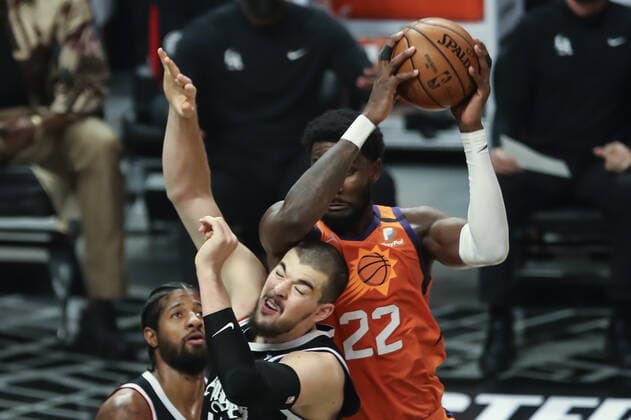 LOS ANGELES, CA - JUNE 24: Phoenix Suns center Deandre Ayton (22) comes down on LA Clippers center Ivica Zubac (40) during the Phoenix Suns game versus the Los Angeles Clippers game 3 NBA, Basketball Herren, USA Western Conference Finals game on June 24, 2021, at Staples Center in Los Angeles, CA. (Photo by Jevone Moore Icon Sportswire) NBA: JUN 24 Western Conference Final - Suns at Clippers Icon210624038