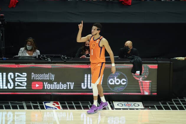 LOS ANGELES, CA - JUNE 24: Phoenix Suns guard Devin Booker (1) checking in during the Phoenix Suns game versus the Los Angeles Clippers game 3 NBA, Basketball Herren, USA Western Conference Finals game on June 24, 2021, at Staples Center in Los Angeles, CA. (Photo by Jevone Moore Icon Sportswire) NBA: JUN 24 Western Conference Final - Suns at Clippers Icon210624045